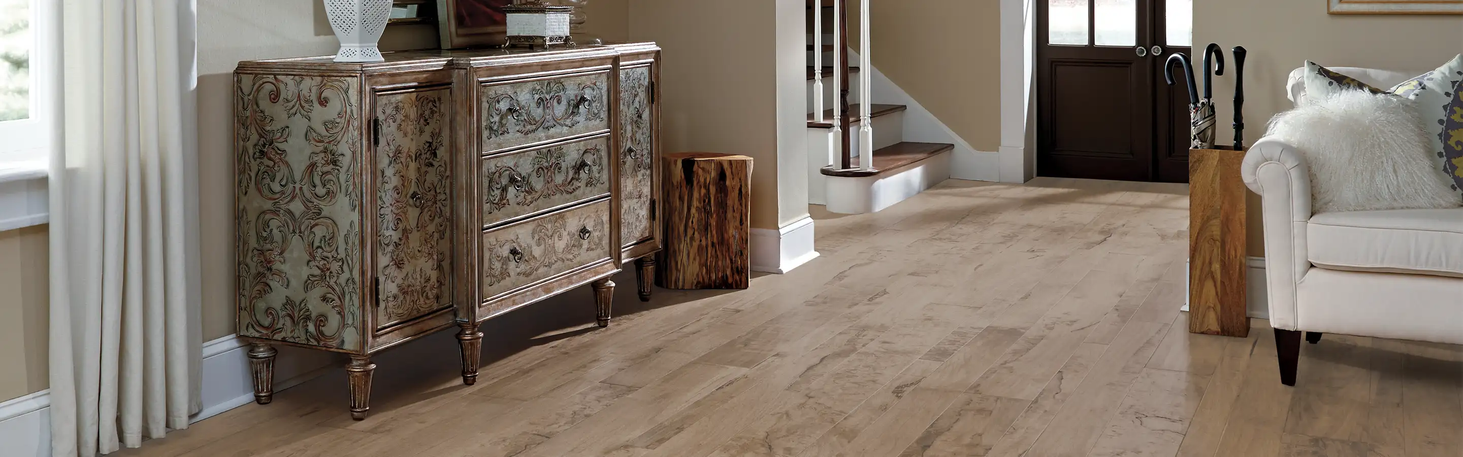 Medium wide plank hardwood in living room and entryway